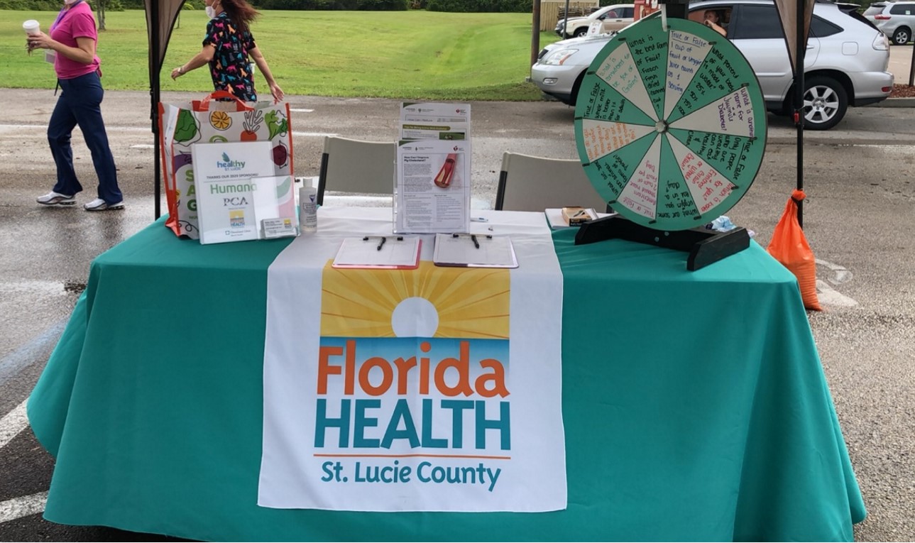 Community outreach health event with residents receiving information